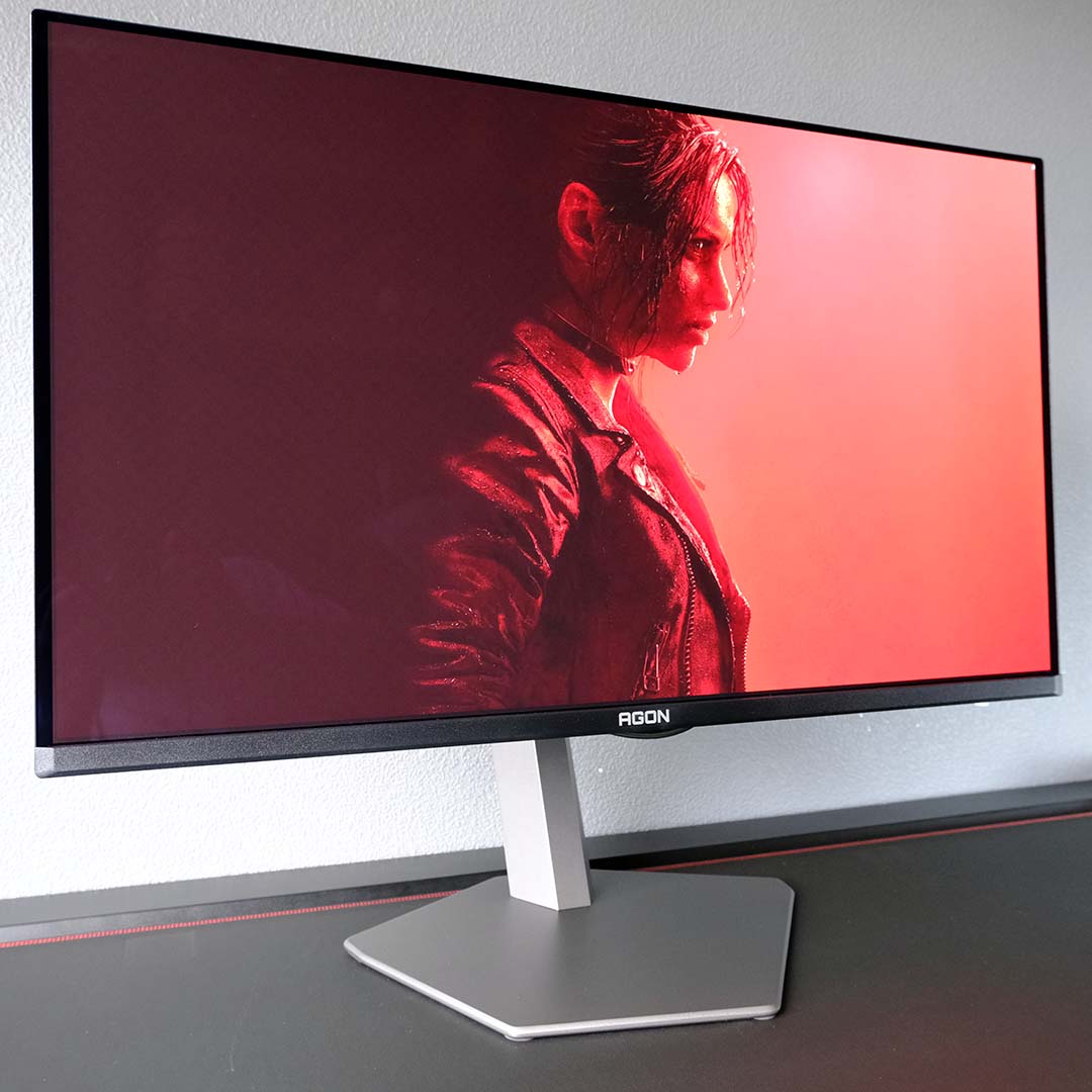 An AOC Agon Pro AG326UZD2 monitor, displaying Resident Evil: Veronica artwork.