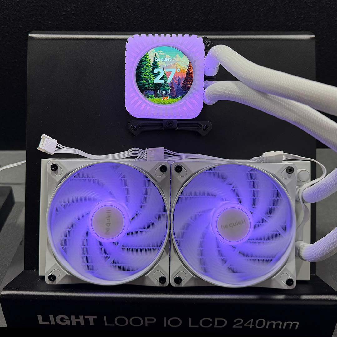 A head-on view of the be quiet! Light Loop IO LCD 240, in white, with purple LEDs.