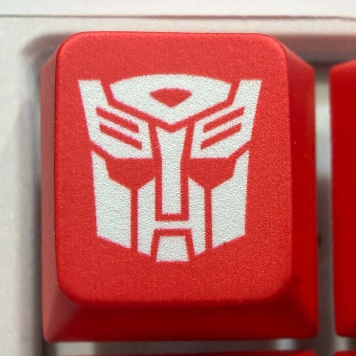 A close-up of the Autobot symbol, on Ducky's Transformers keyboard concept.