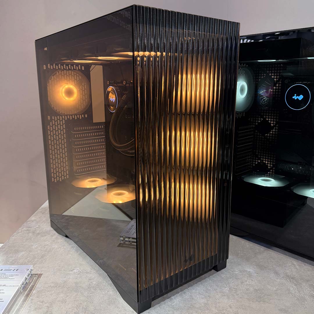 An InWin Breeze case, black in colour with amber RGB LED fans.