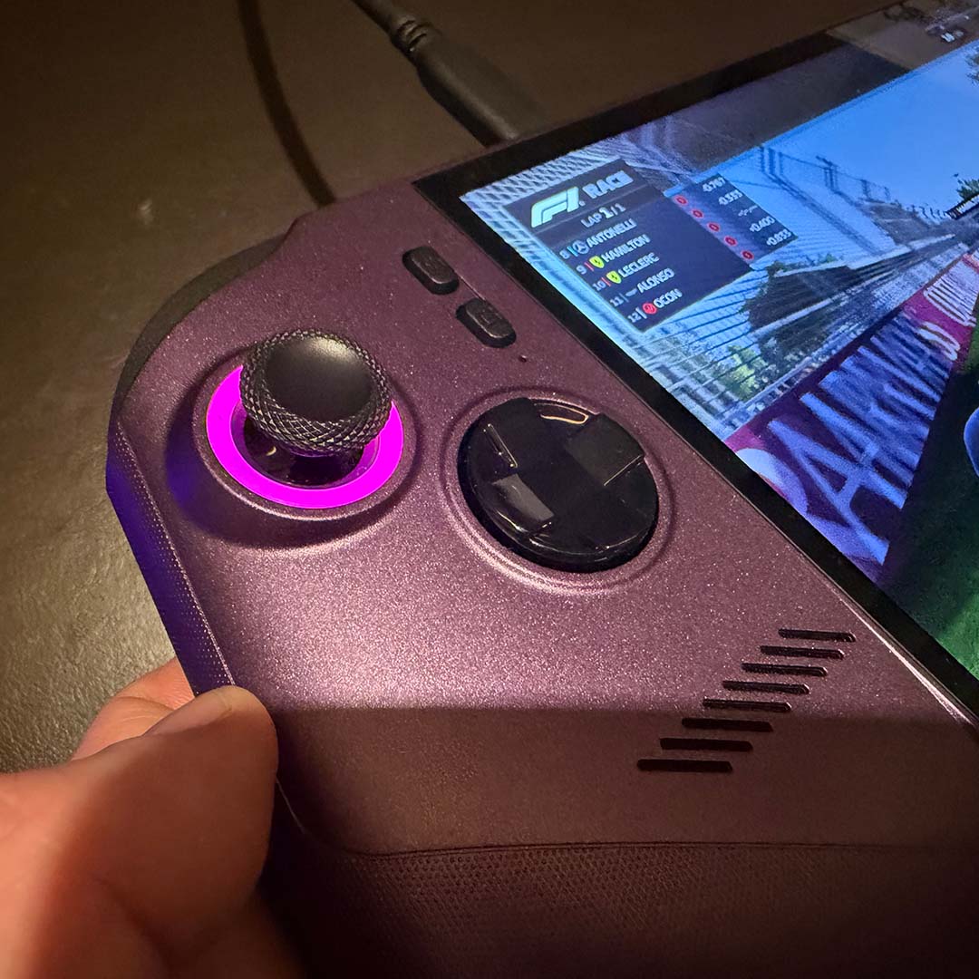 A close-up of the left thumbstick and directional-pad on the MSI Claw 8 EX AI+.