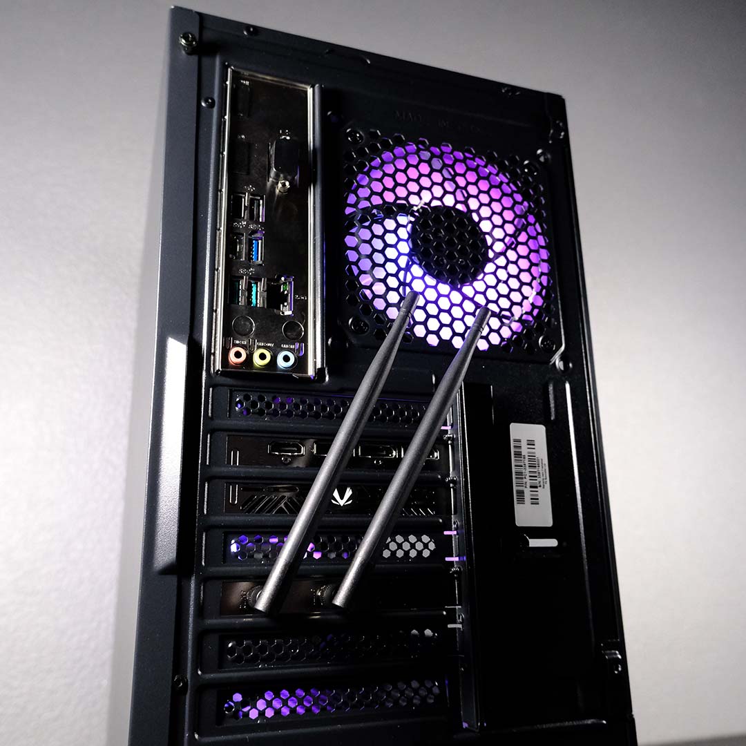 The back of the PCSpecialist Storm Elite II, with WiFi aerials installed.
