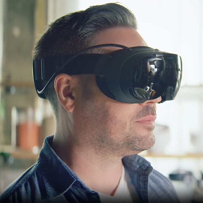 A side-on view of a person wearing a Steam Frame.