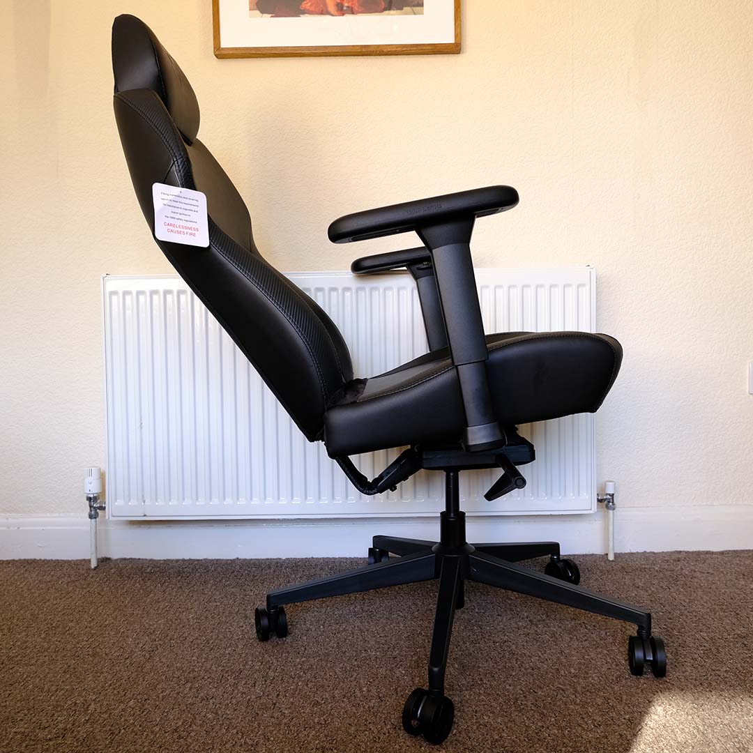 The ThunderX3 Solo 360 gaming chair, tilting backwards.