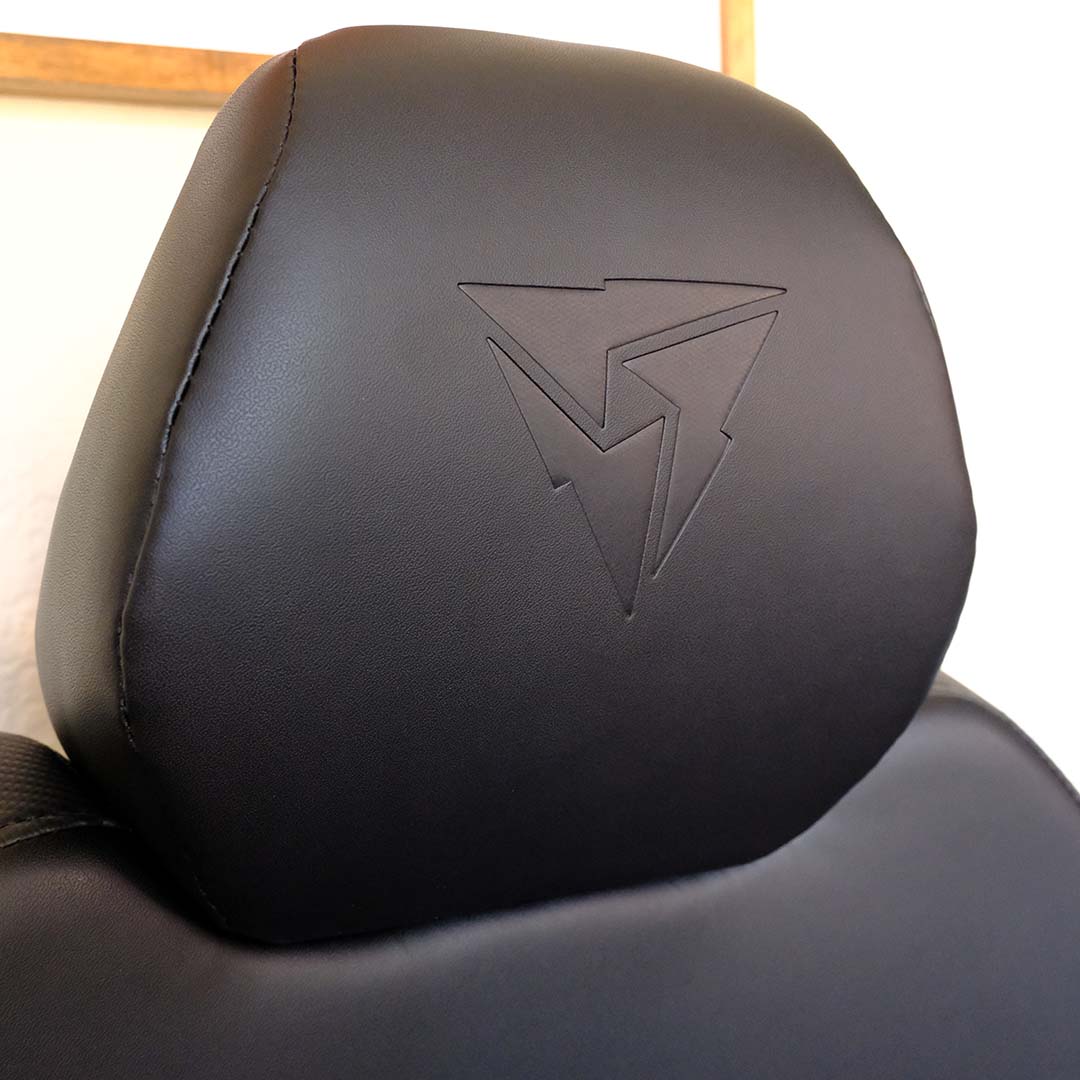 A close-up of the headrest on the ThunderX3 Solo gaming chair.