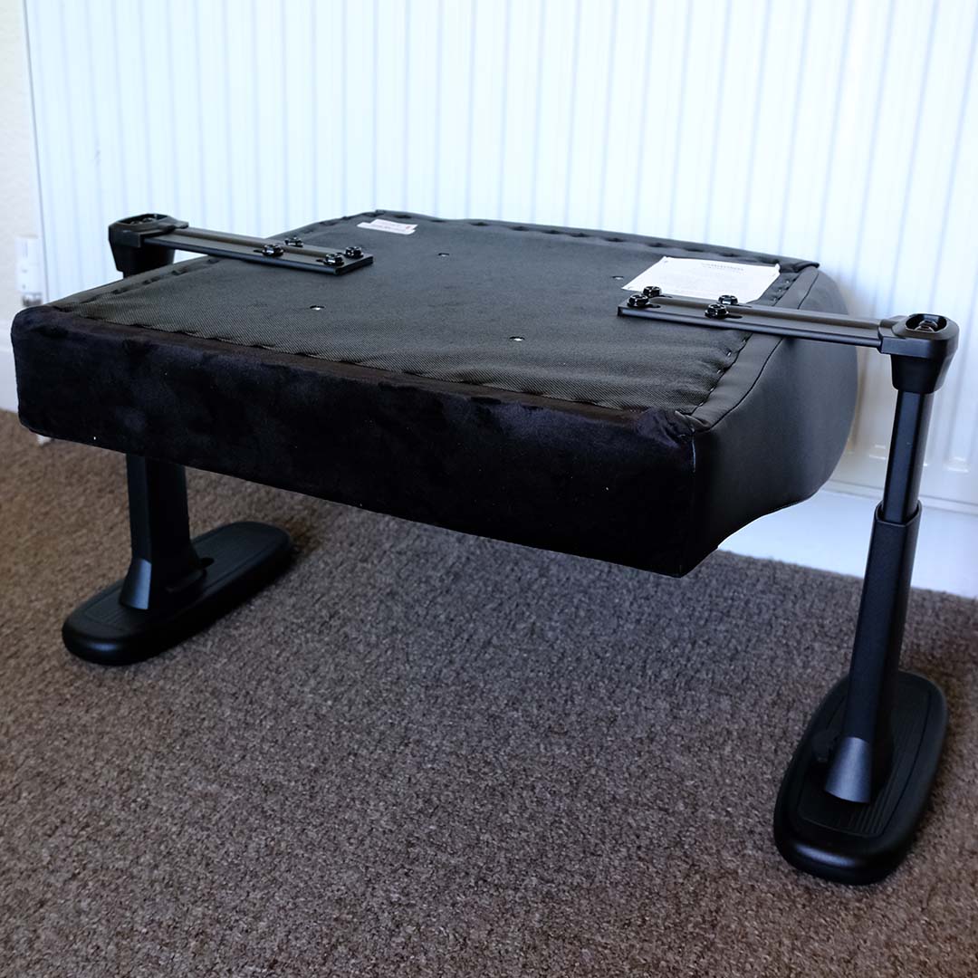 The ThunderX3 Solo 360, mid-construction, featuring arms and seat base.
