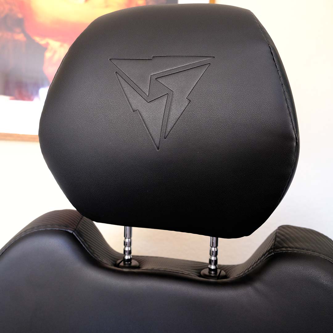A close-up of the ThunderX3 Solo 360's headrest, raised in height.