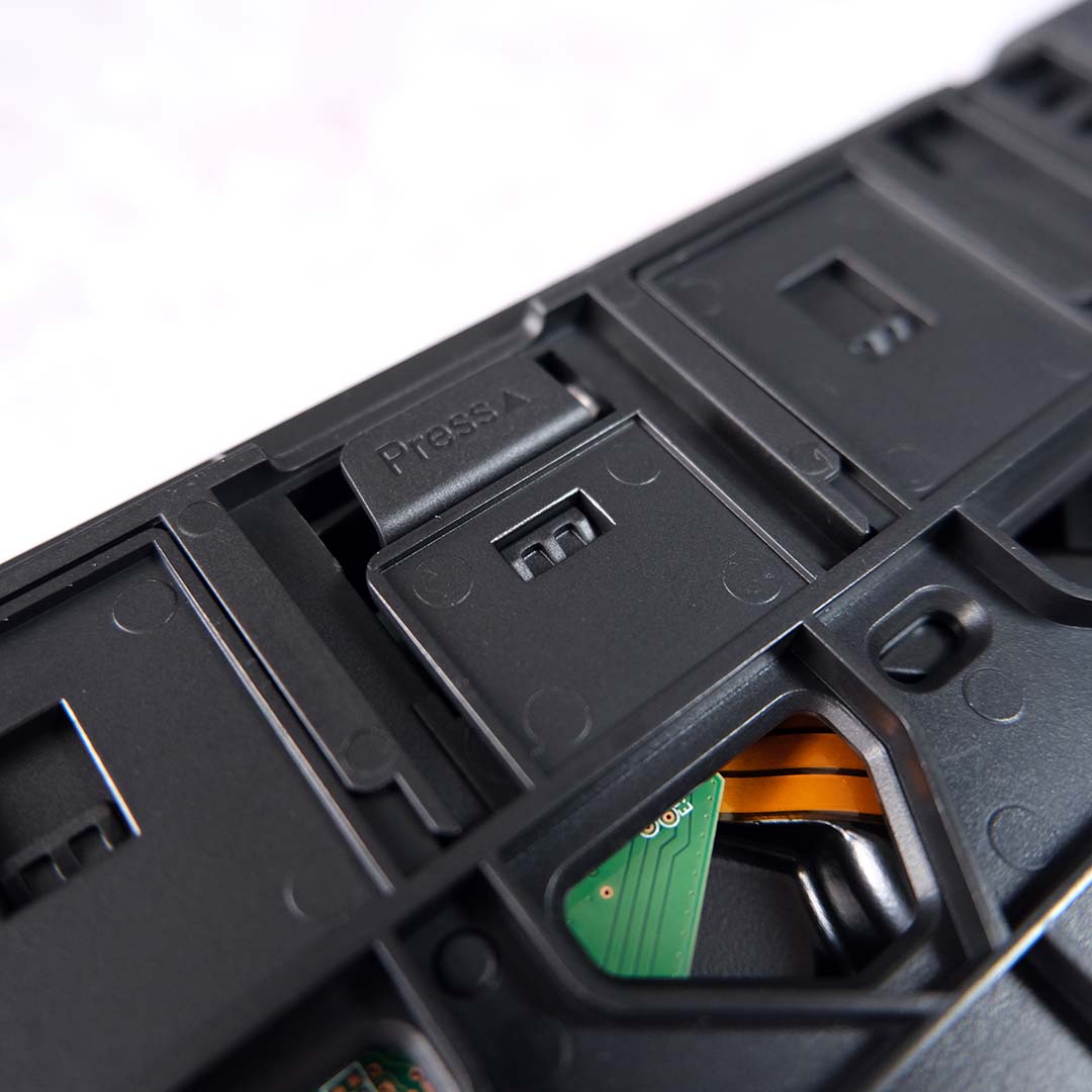 A close-up of the HDD latch on the Ugreen NASync DXP4800 GT bay.