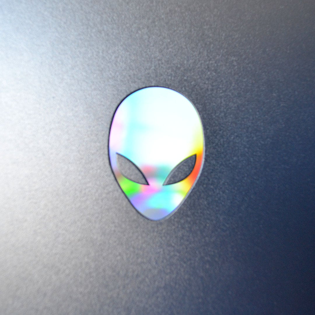 A close-up of the Alienware logo, with light refracting.