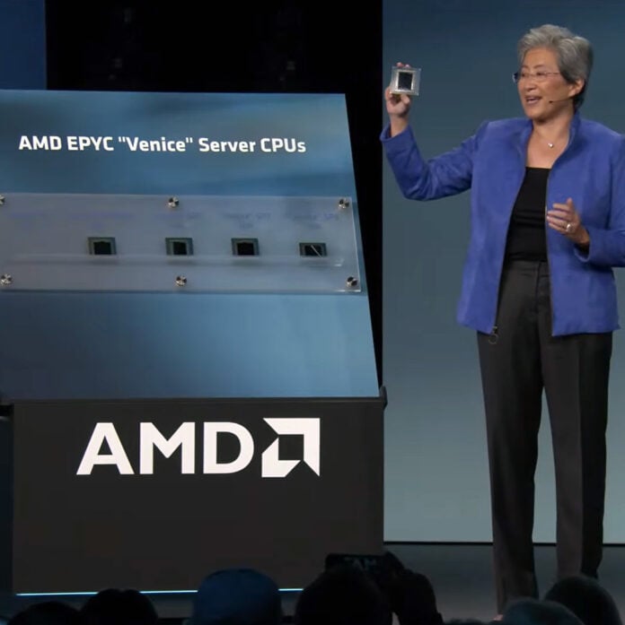 Dr. Lisa Su (right), president and CEO of AMD, holds an AMD Epyc 'Venice' Server CPU in her hand.