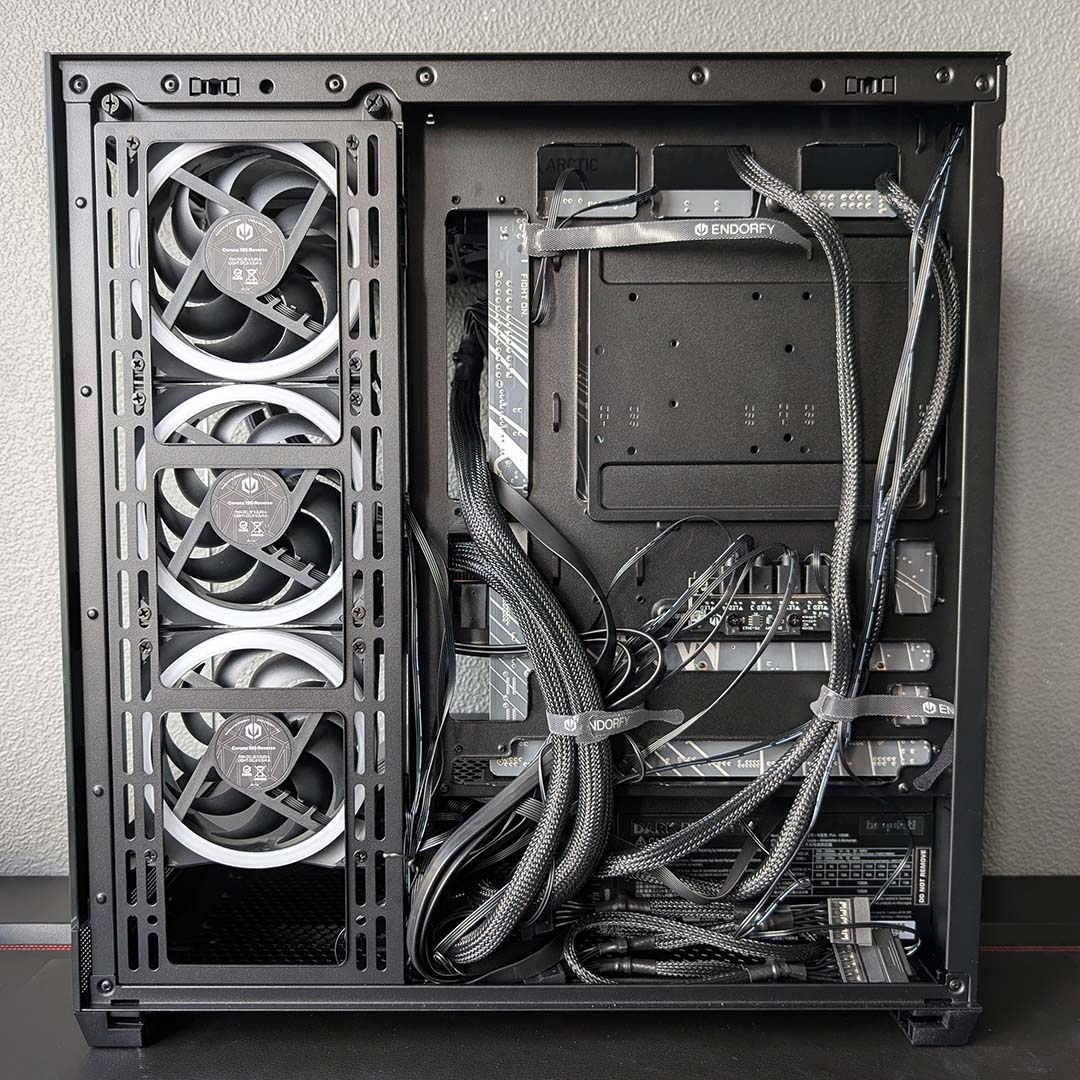The Fishtank 6000 Corona's rear panel, cable management exposed.
