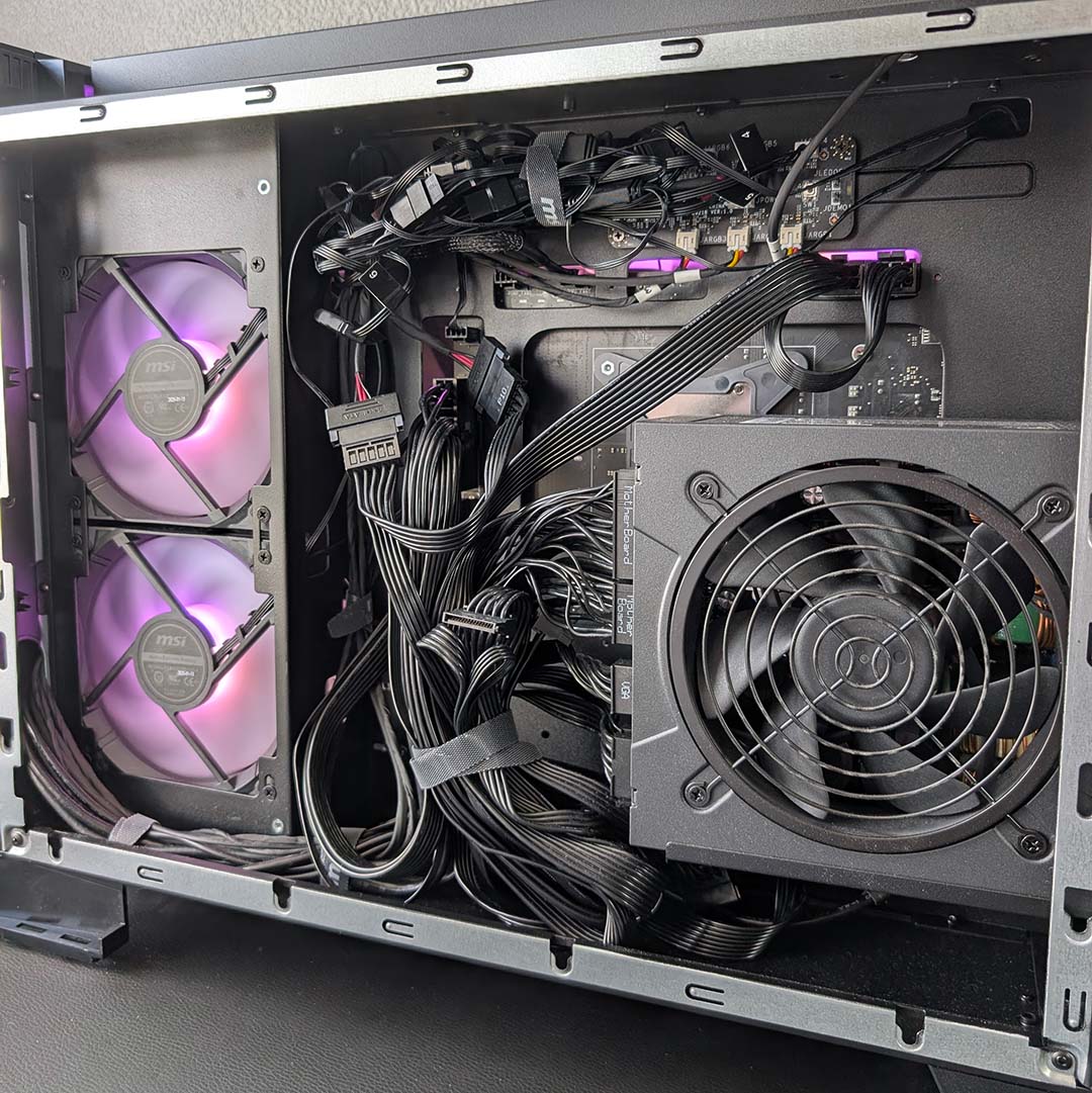 A close-up of the cable management inside the MEG Vision X AI.