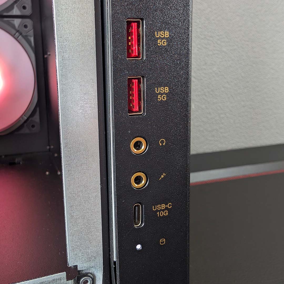 A close-up of the front I/O for the MEG Vision X AI.