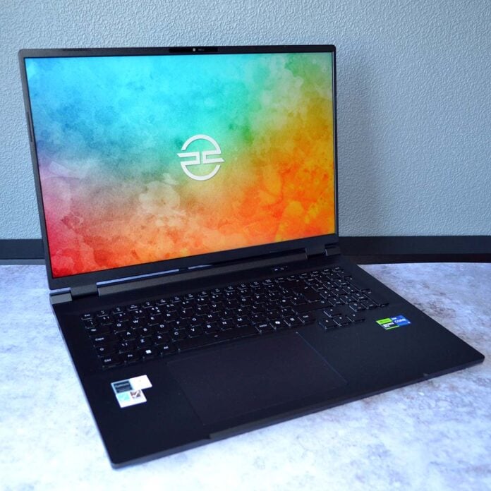PCSpecialist Ionico 18 laptop, atop a white surface.