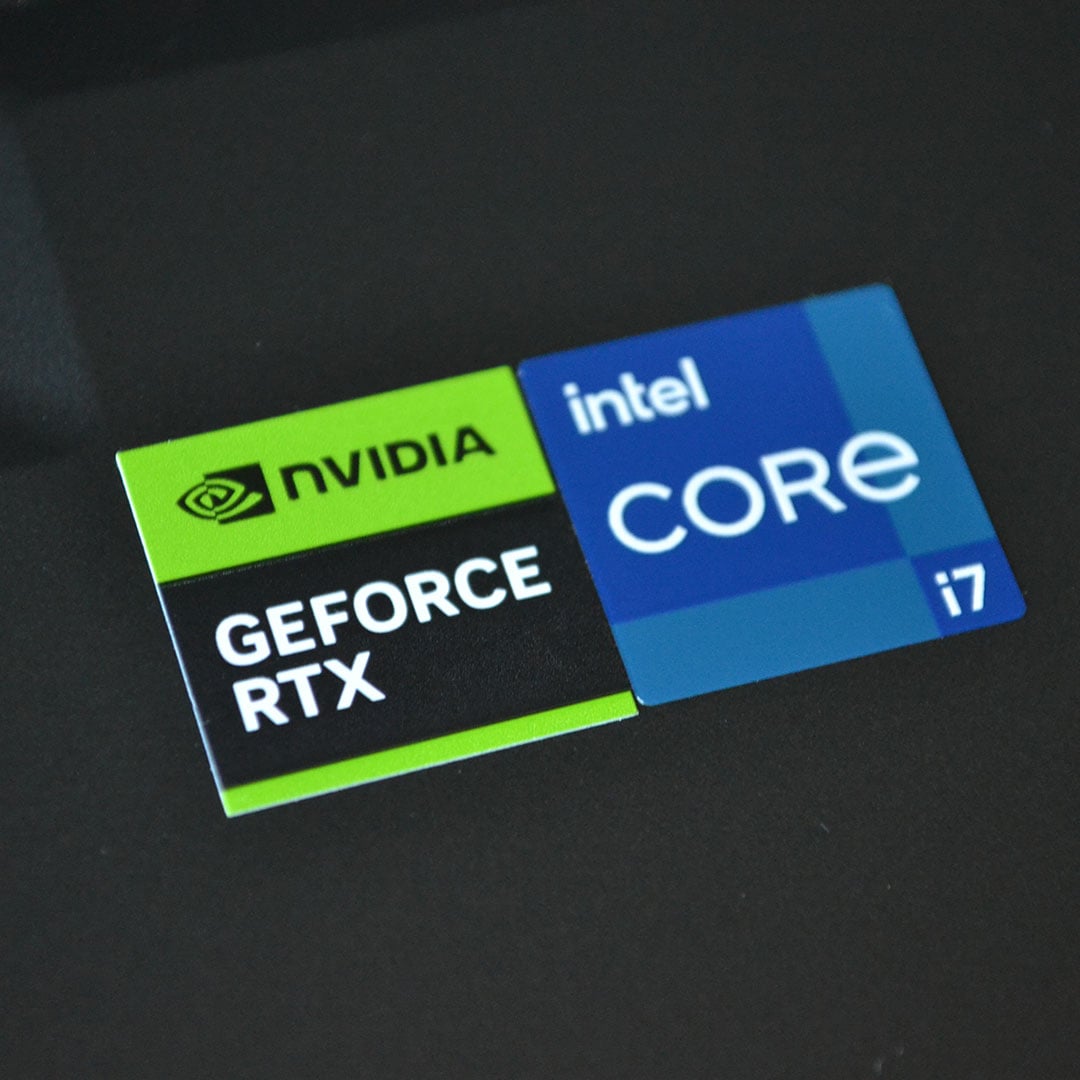 A close-up of an Nvidia GeForce RTC and Intel Core i7 sticker.