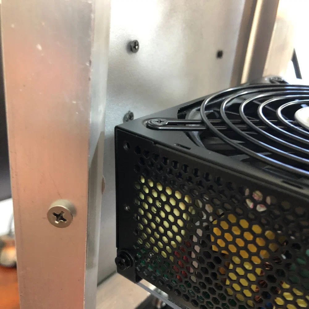 A close-up of PSU clearance inside the custom rotating PC build.