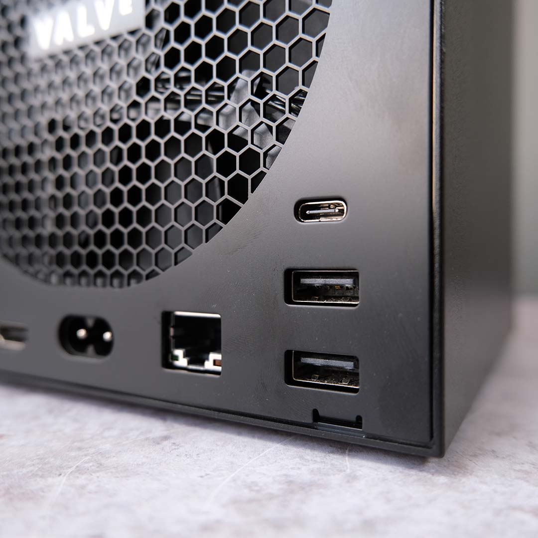 A close-up of the Steam Machine's rear USB ports and Ethernet.