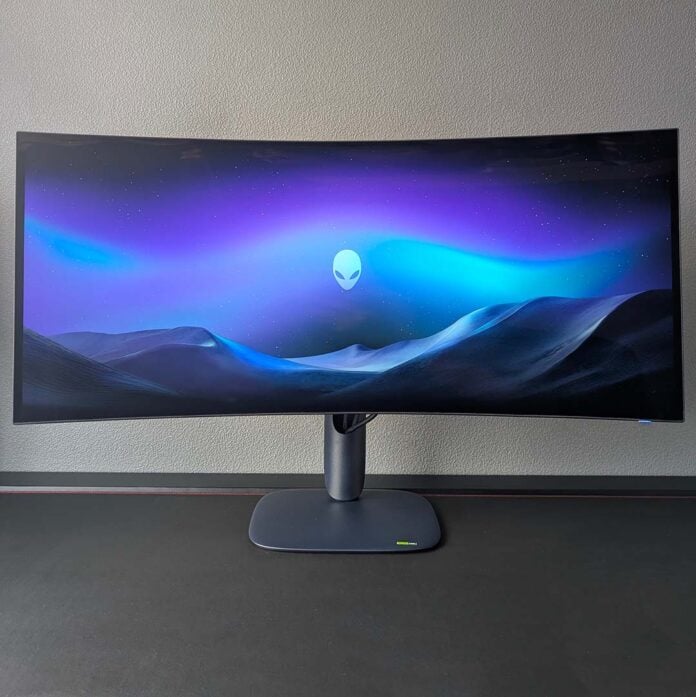 The AW3926QW displaying an Alienware background.