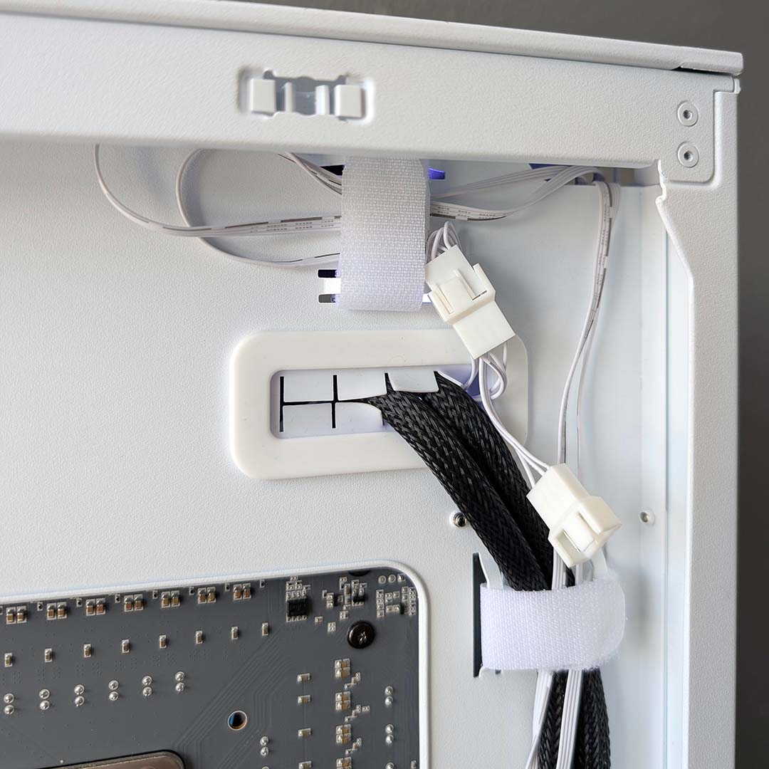 A close-up of PWM fan connectors and daisy chain connectors.
