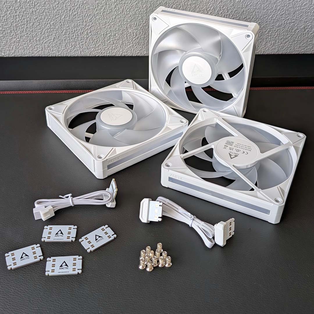 A trio of Arctic Bionix P14 fans (right) and their accessories.