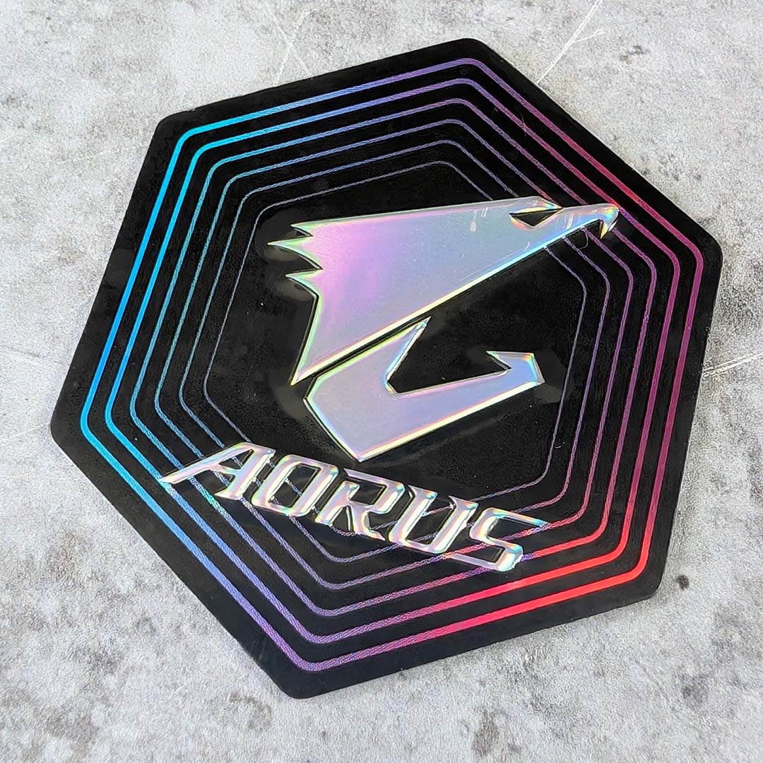 A reflective Aorus metallic icon.