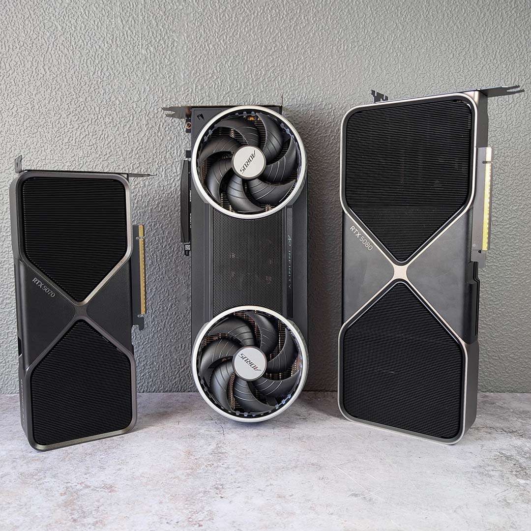 A GeForce RTX 5070 (left), Gigabyte Aorus GeForce RTX 5070 Infinity (centre), and GeForce RTX 5080 (right), all standing upright.