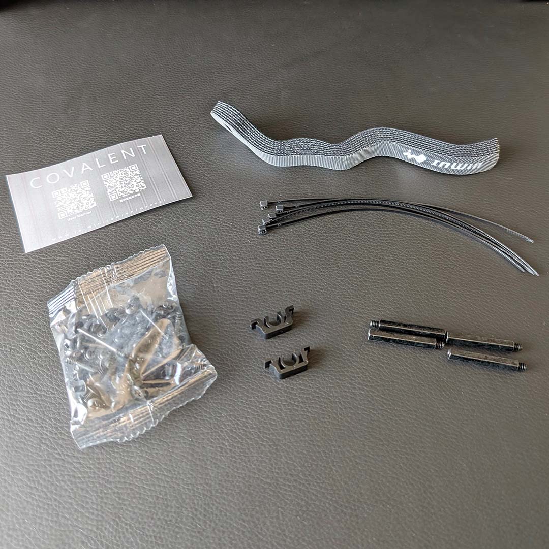 A opt-down view of the InWin Covalent's accessories.