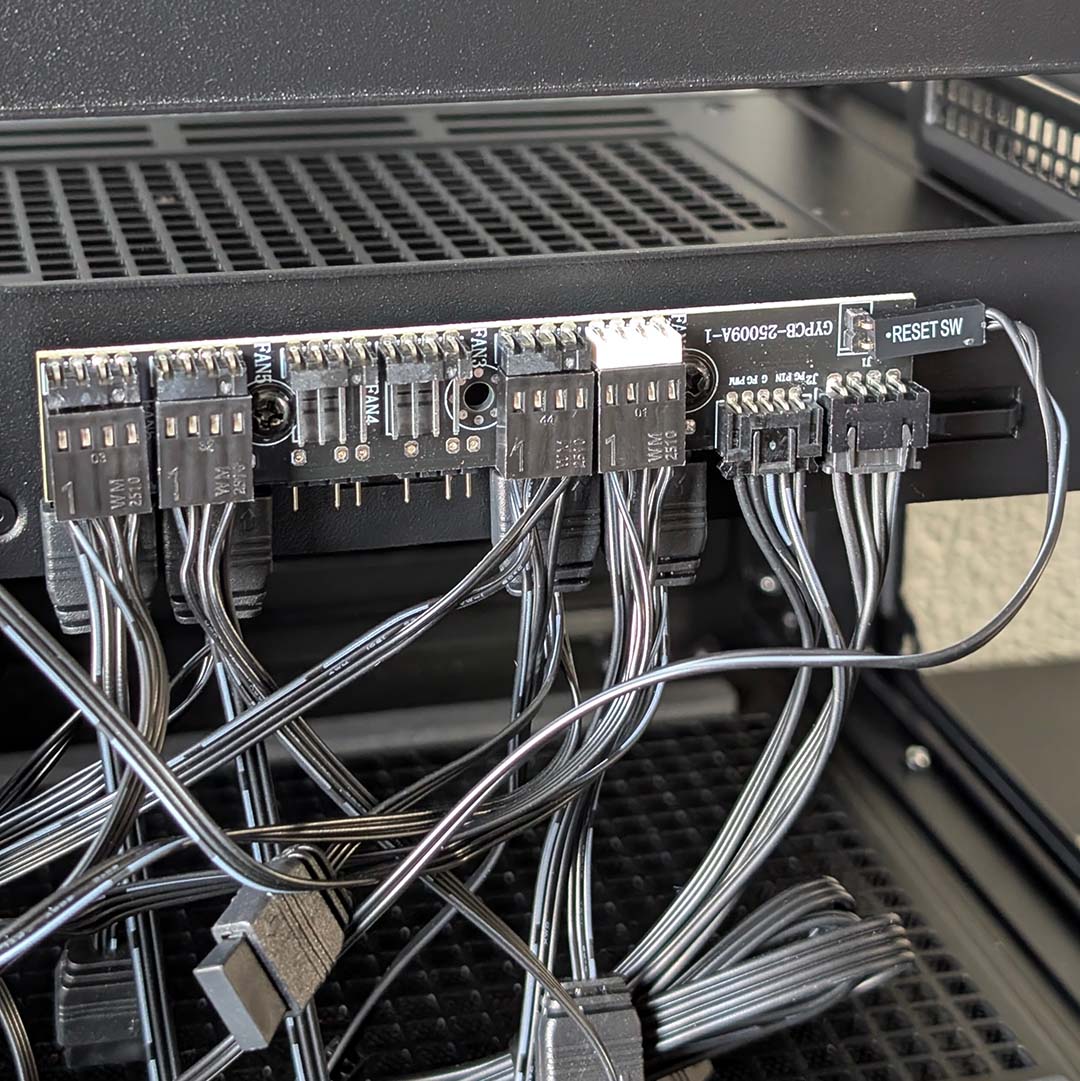 A close-up of the InWin Covalent's fan and ARGB controllers.