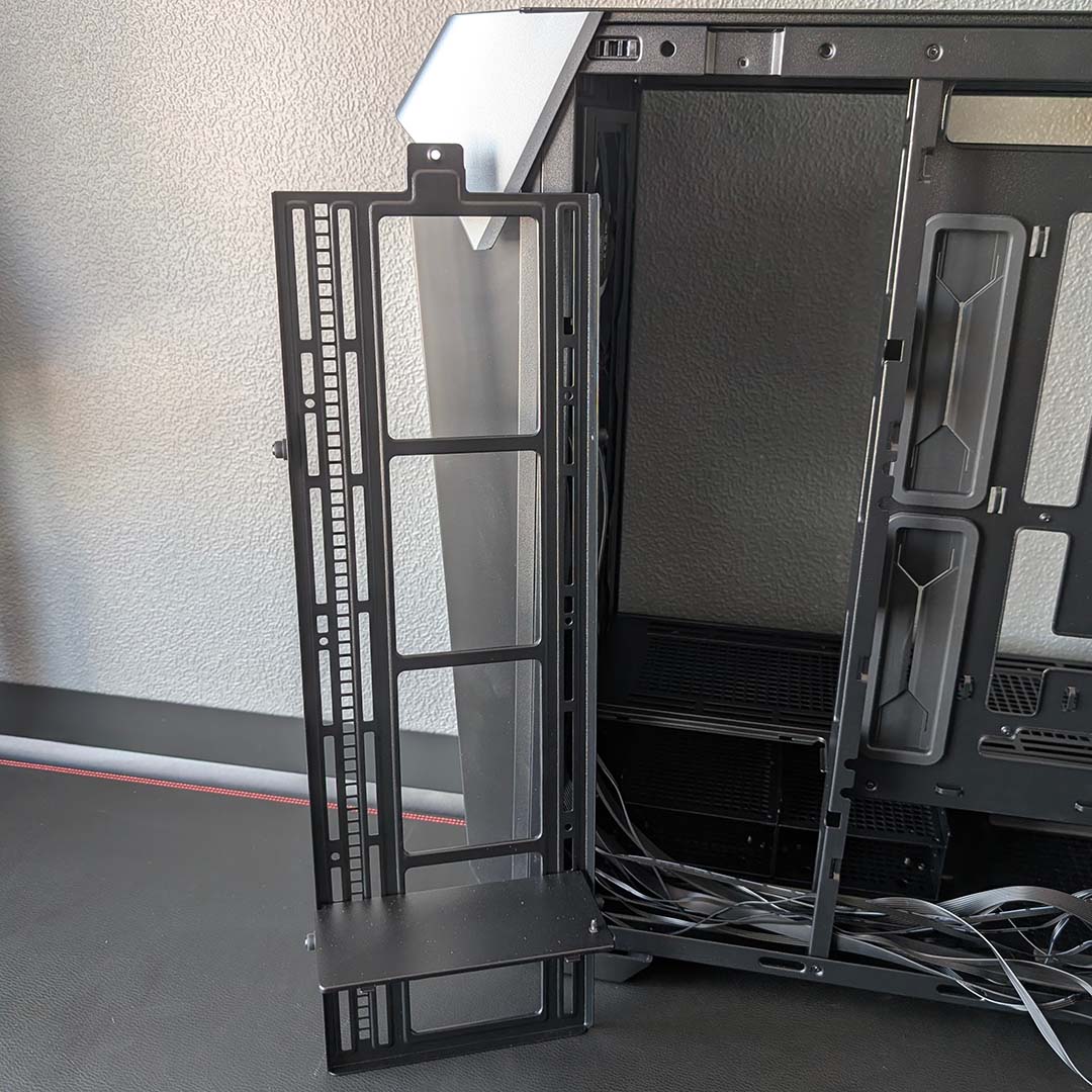 A top-down view of the InWin Covalent's side fan bracket, removed from the case.