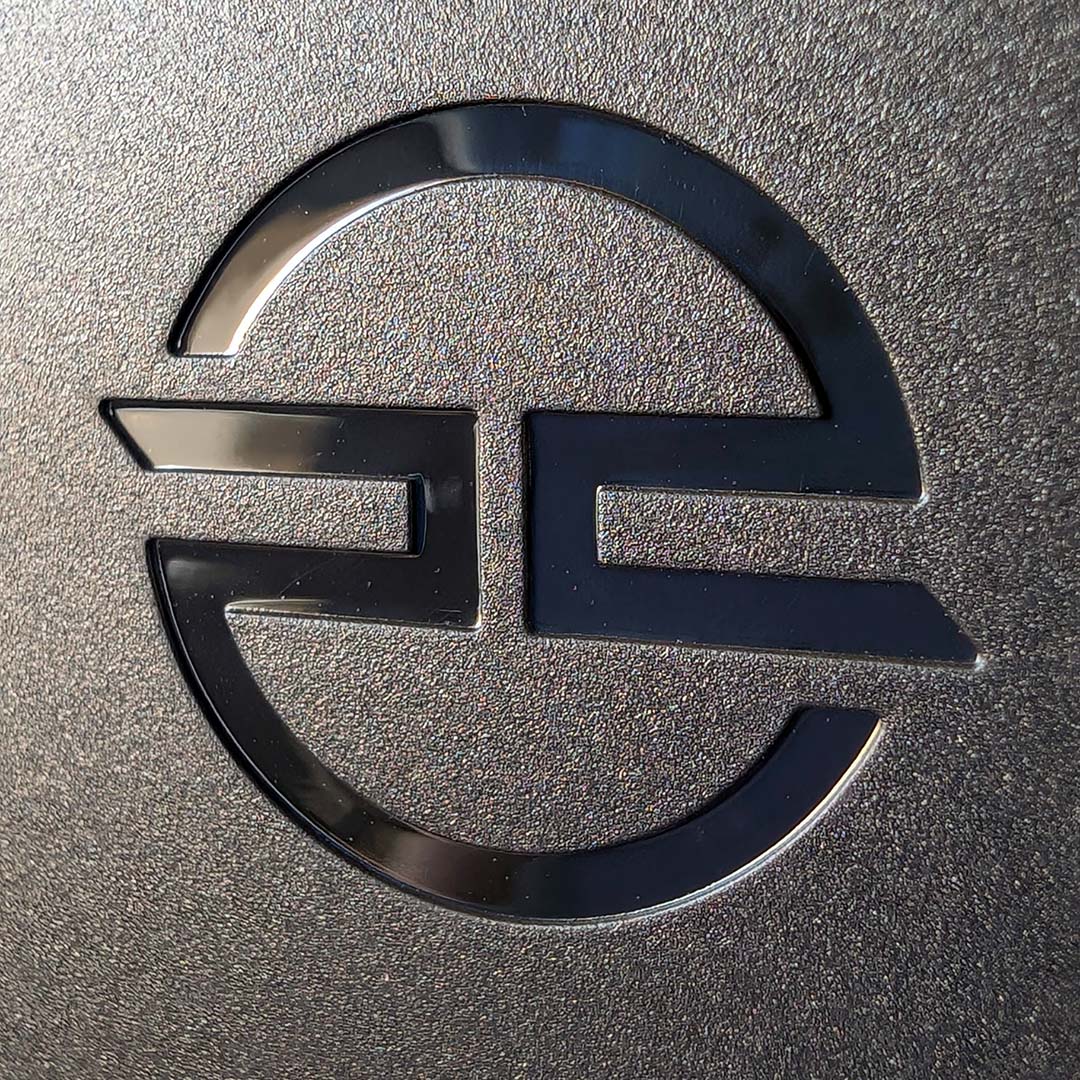 A close-up of a PCSpecialist 'PCS' logo.