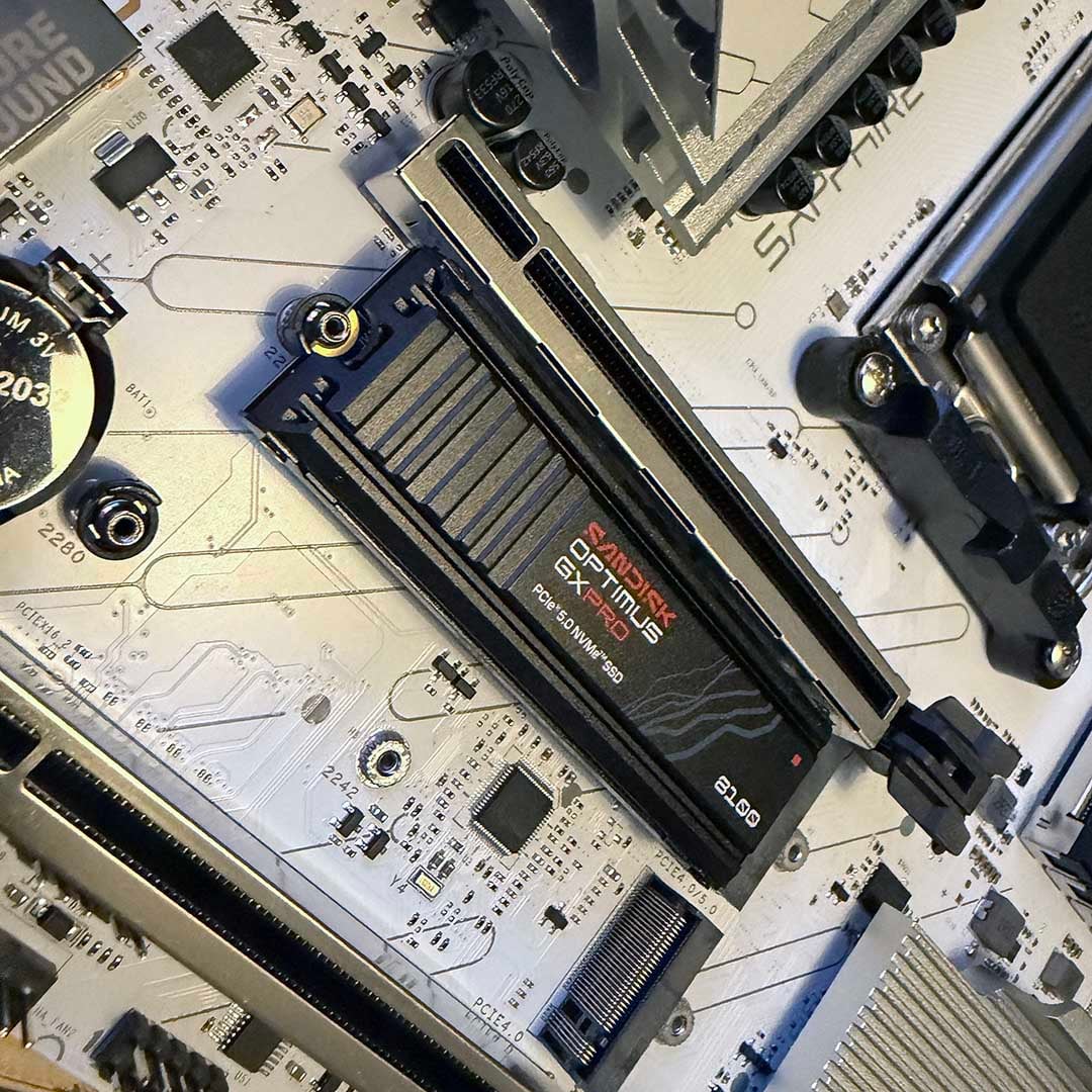 Sapphire Pure B850M with a Sandisk Optimus GX Pro 8100 SSD in its top M.2 slot