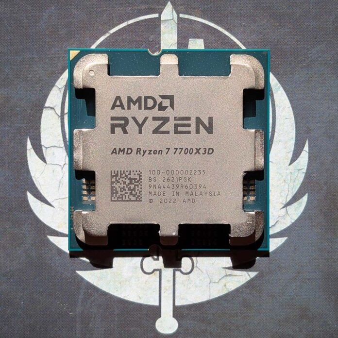 An AMD Ryzen 7 7700X3D atop a drinks coaster featuring a Brotherhood of Steel logo.
