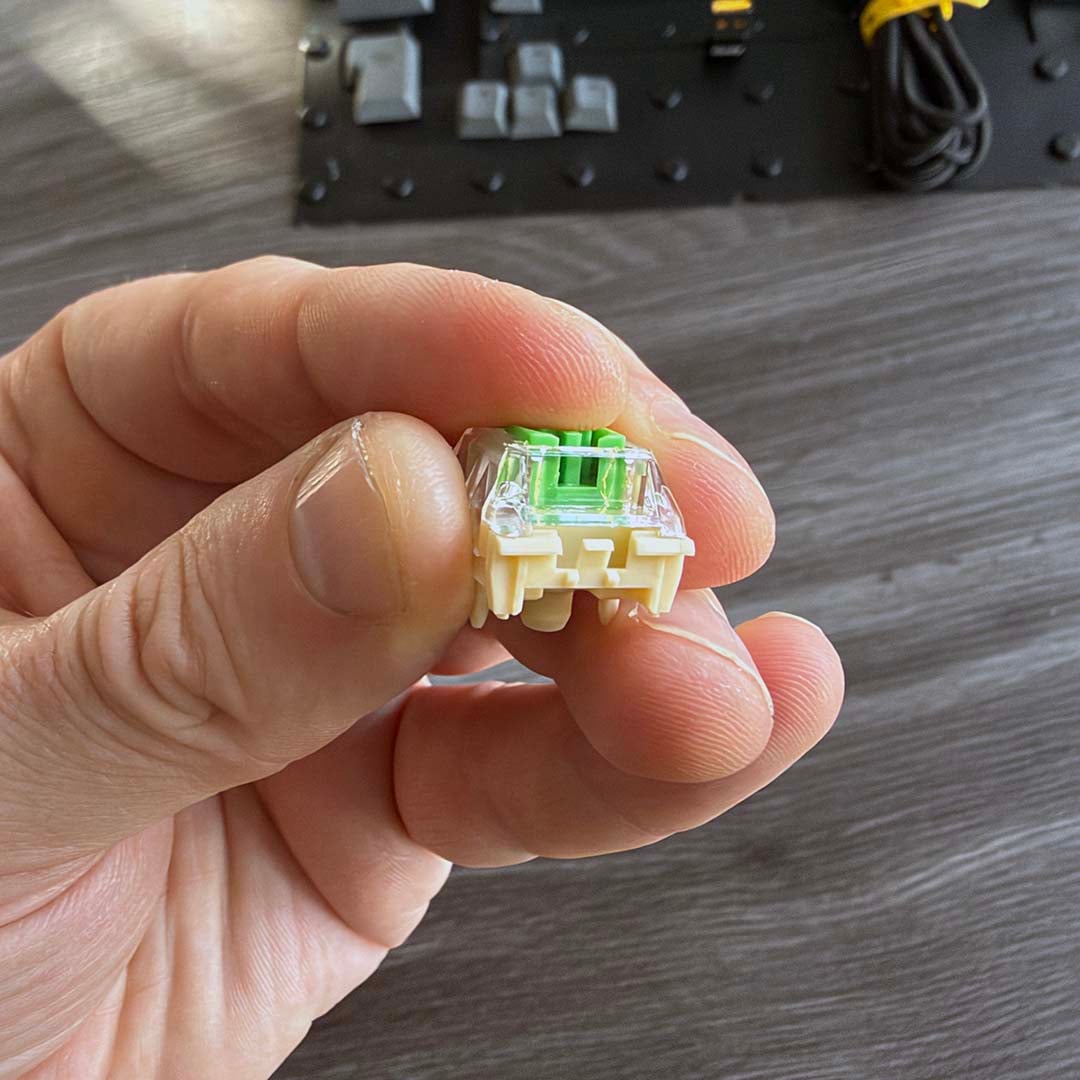 Ducky Shush Green tactile switch pressed down