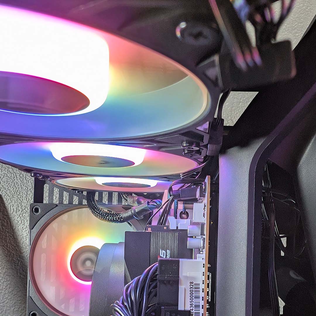 A close-up of a cooler inside the Hyte Y50 RGB, sitting very flush to the spine.