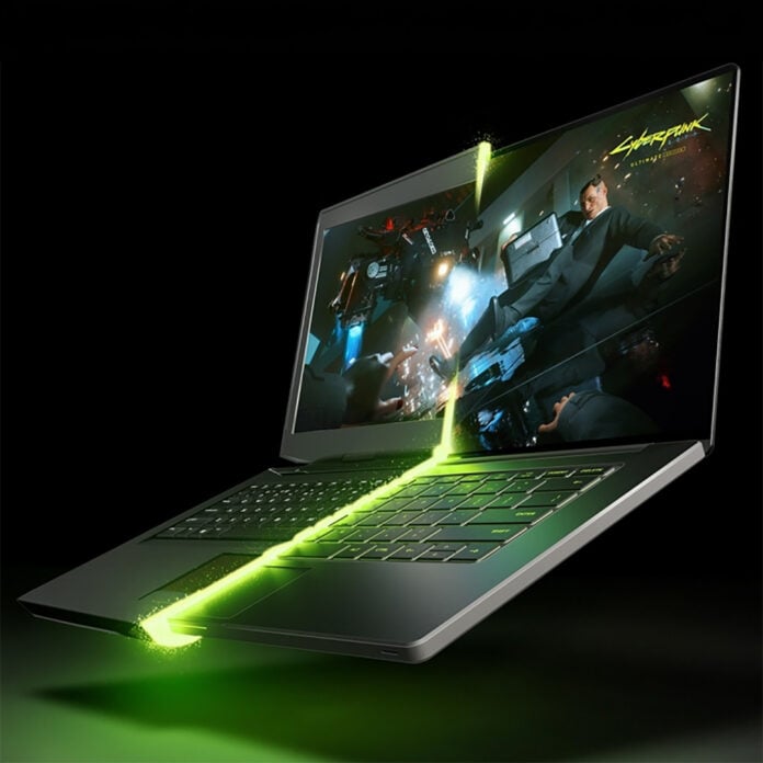 An Nvidia laptop, cut in half with a green light.