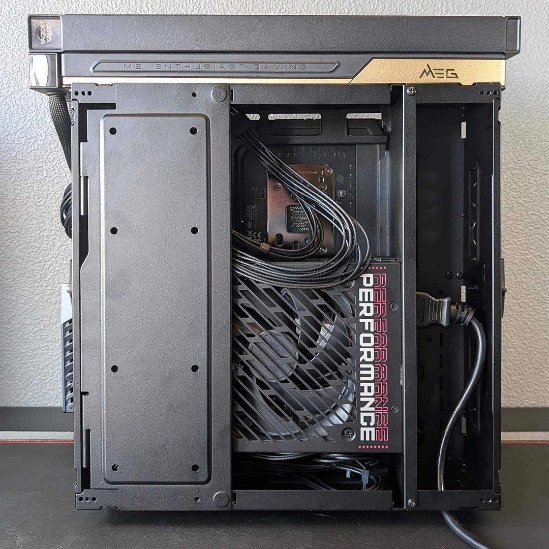 The MSI MEG Maestro 900R's detachable motherboard tray, filled with components.
