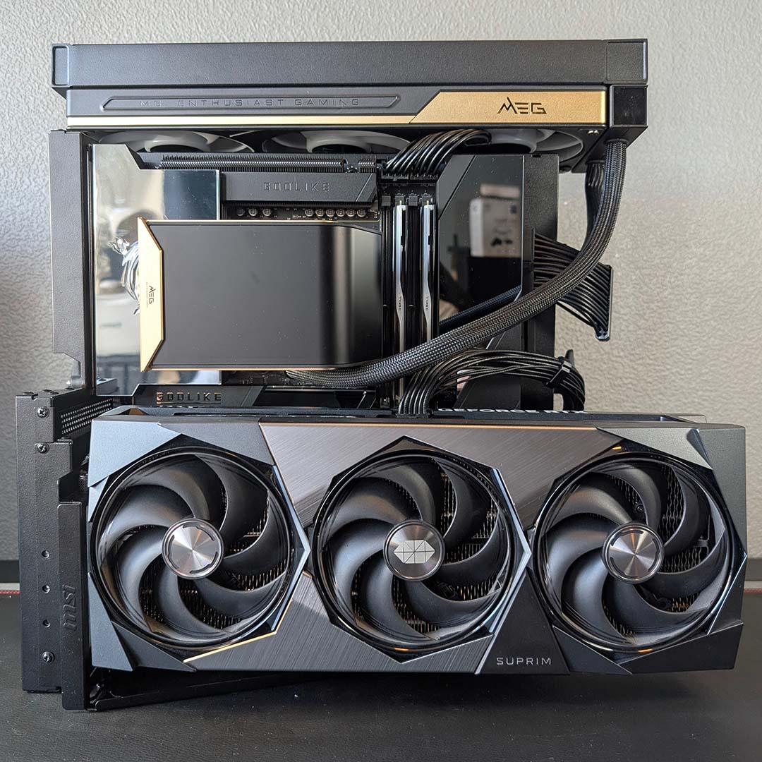 The MSI MEG Maestro 900R's detachable motherboard tray, filled with components.