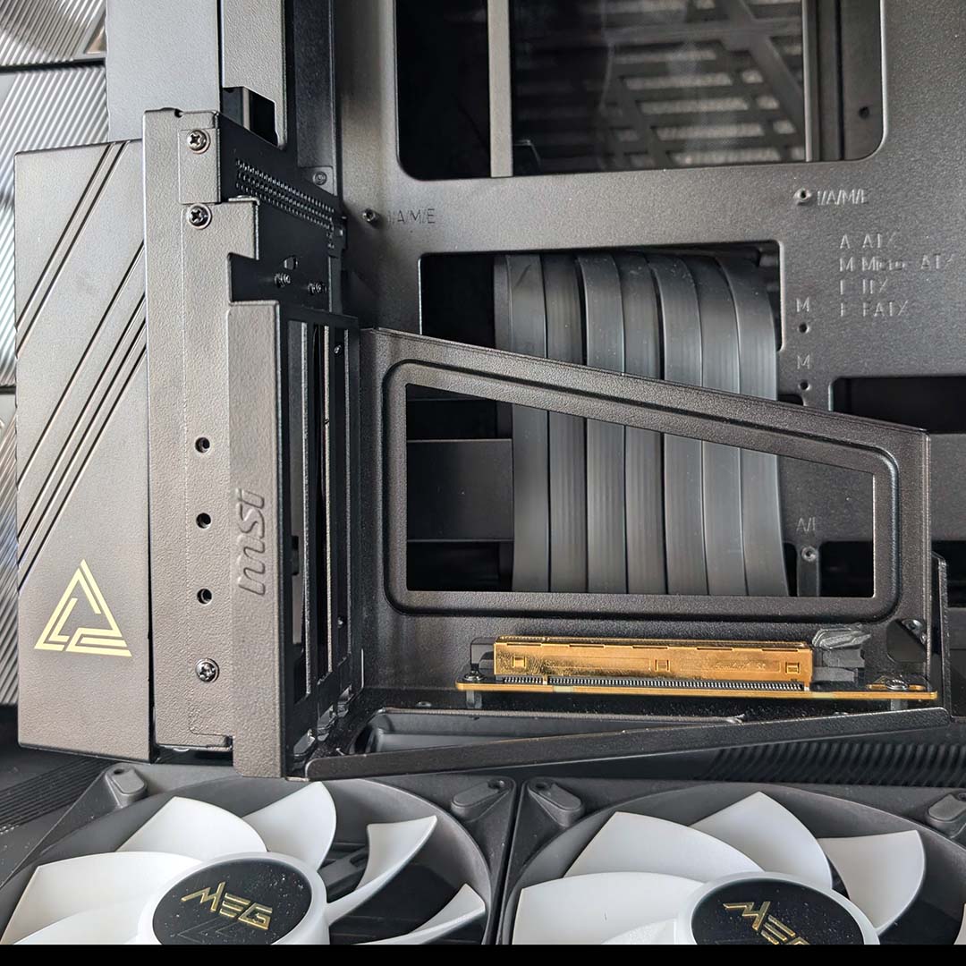The vertical GPU bracket inside the MSI MEG Maestro 900R.