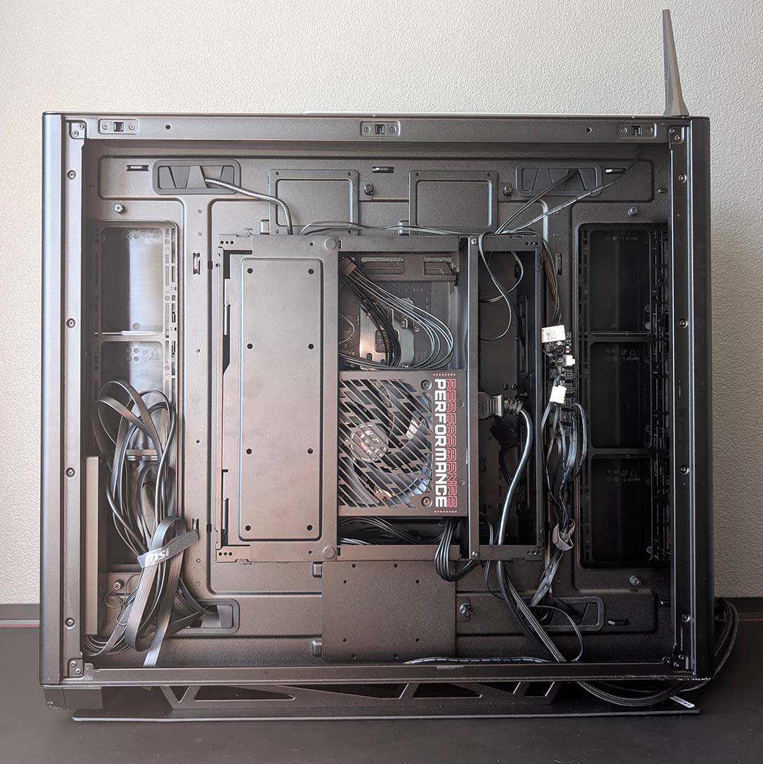 The rear chamber of the MSI MEG Maestro 900R, filled with cables.