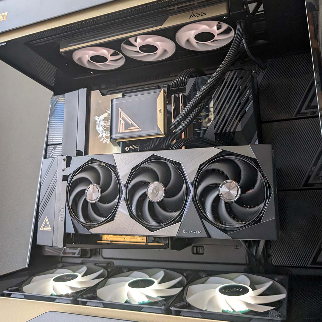 A side-on view of internal components inside the MSI MEG Maestro 900R.