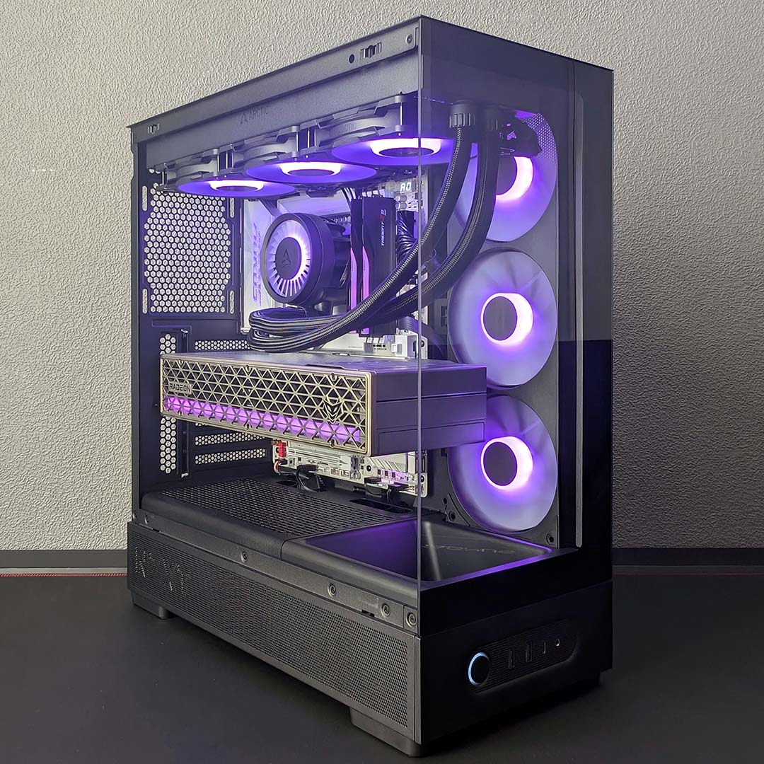 A front-side view of the NZXT S5 RGB, with a complete system inside it, glowing purple.