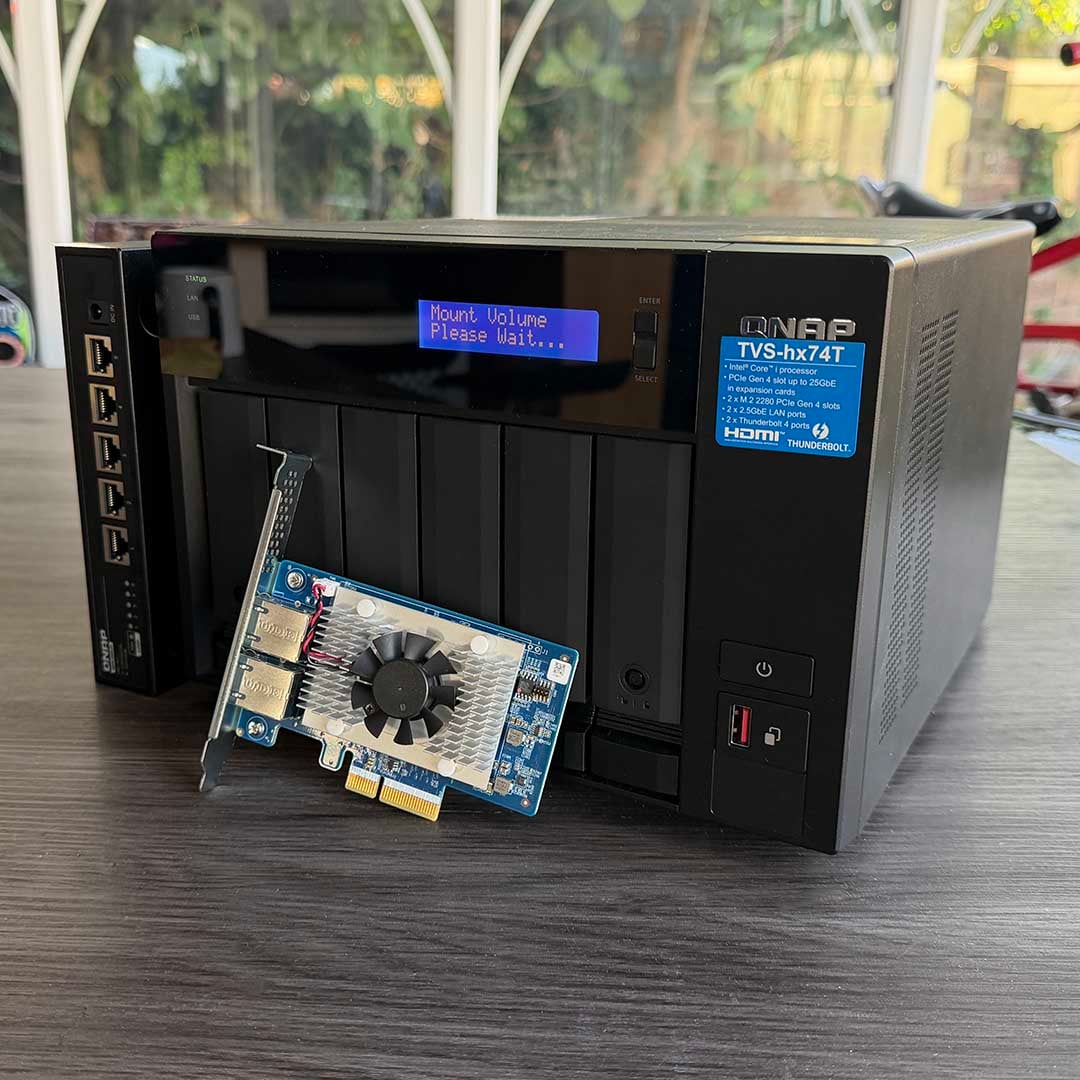 QNAP TVS-h874T NAS, QSW-3205-5T switch, and QXG-10G2T-X710 network card