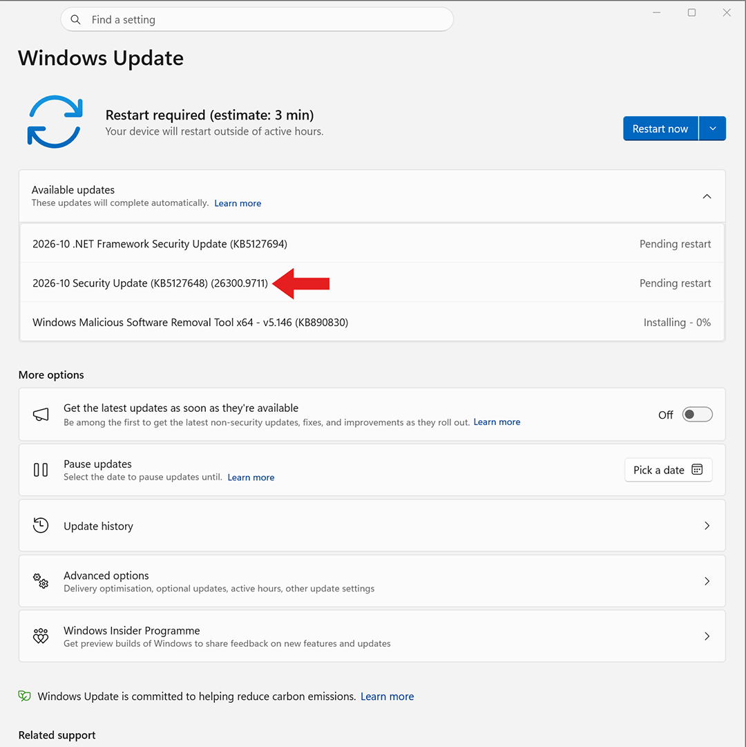A screenshot of Windows Update, with a red arrow pointing to the update that includes a mouse stuttering fix.